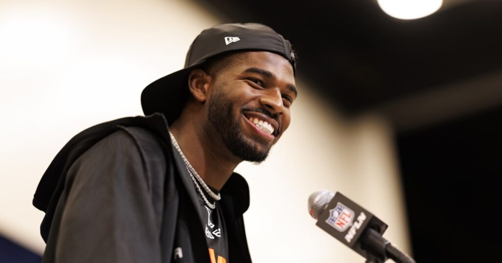 INDIANAPOLIS, INDIANA - FEBRUARY 28: Shedeur Sanders #QB13 of Colorado speaks at the podium during the 2025 NFL Combine at the Indiana Convention Center on February 28, 2025 in Indianapolis, Indiana.
