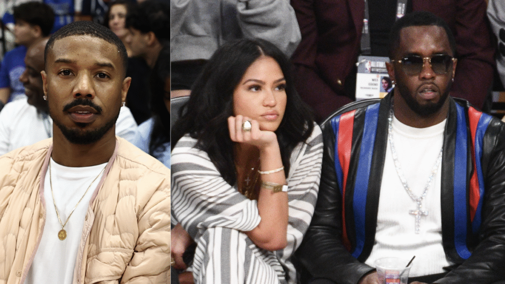 Michael B. Jordan in a beige jacket, Cassie in a striped outfit, and Diddy in sunglasses and a colorful jacket at a sports event.