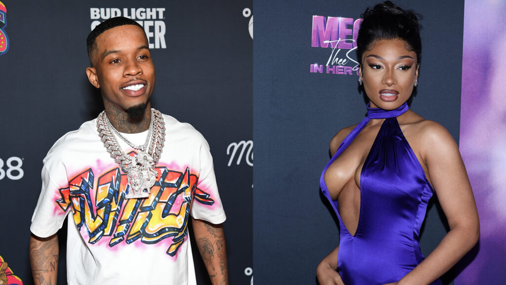 Tory Lanez in a white graphic tee with chains, and Megan Thee Stallion in a purple dress at a red carpet event.