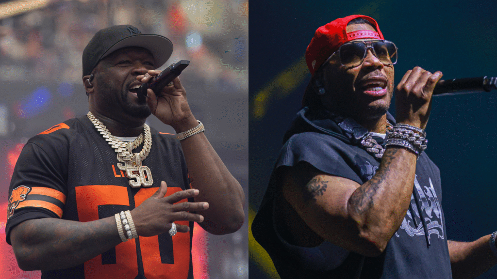 50 Cent Says Nelly’s Story About Him Apologizing to Ashan… Two images side by side: 50 Cent performing in a black and orange jersey, and Nelly performing in a black sleeveless hoodie and red cap.