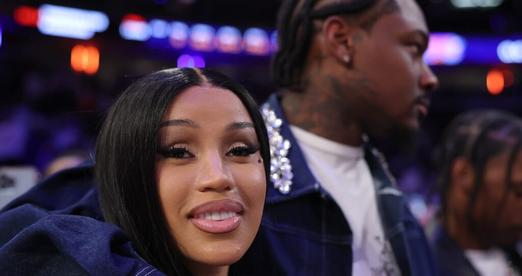 NFL Player Stefon Diggs (R) and rapper Cardi B (L) celebrate after Game Four of the Eastern Conference Second Round NBA Playoffs between the Boston Celtics and the New York Knicks at Madison Square Garden on May 12, 2025 in New York City.