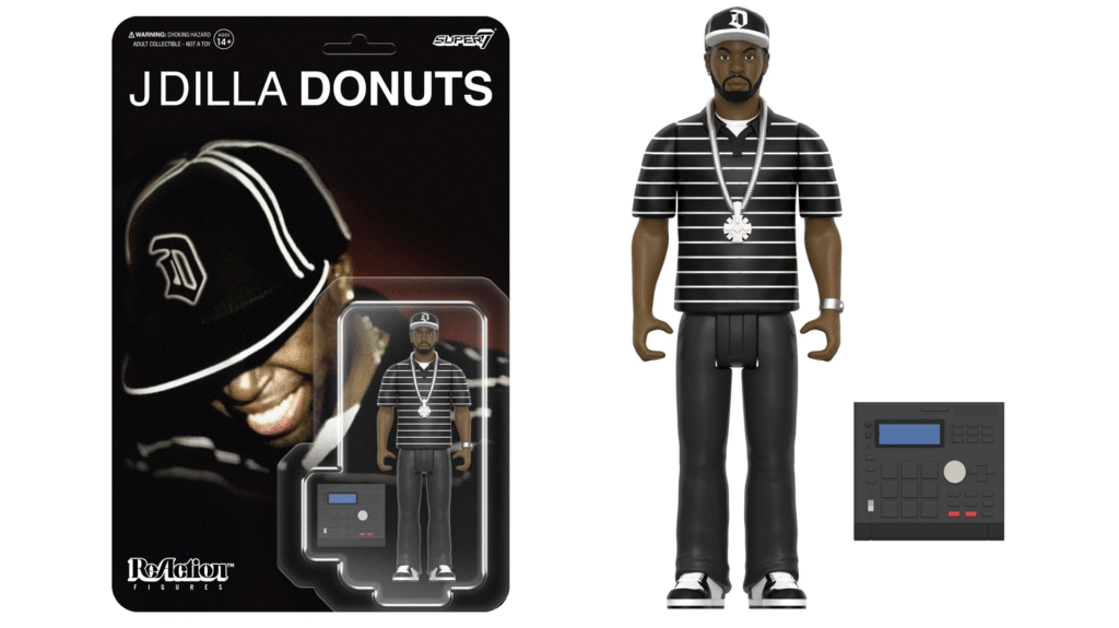 Action figure of J Dilla with a striped shirt, cap, and chain, alongside a music production device. Package labeled "J Dilla Donuts."