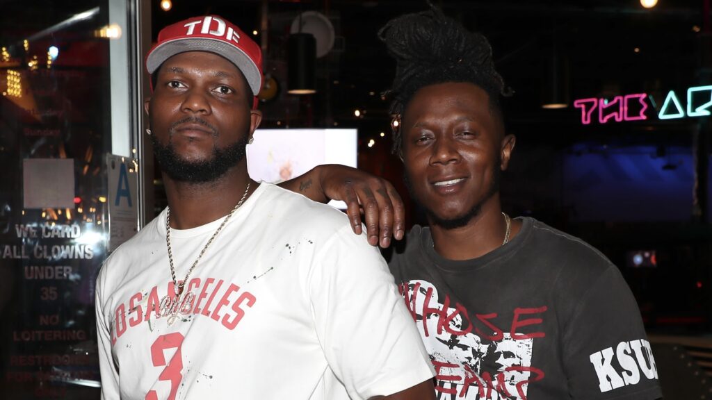 Brandon "Big B" Tiffith and Anthony "Moosa" Tiffith attend Isaiah Rashad's "The House Is Burning" album listening event