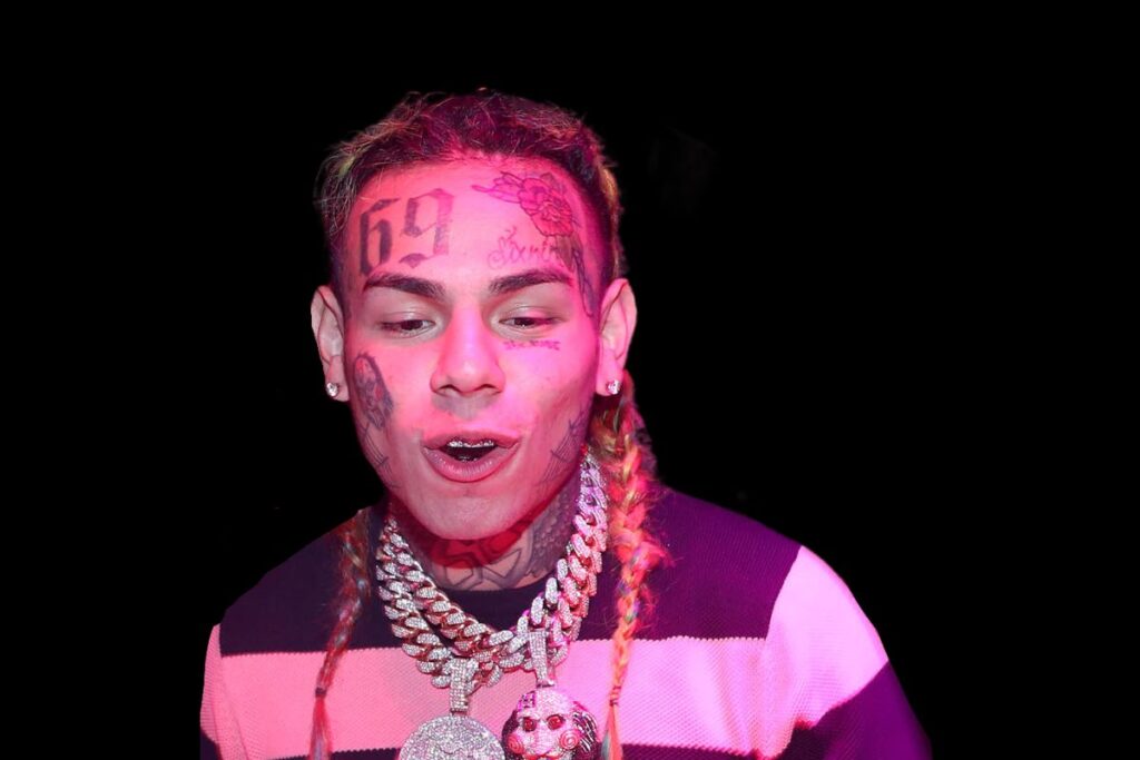 6ix9ine Thrown Out Of Club, Handcuffed, Rages At Cops After Altercation