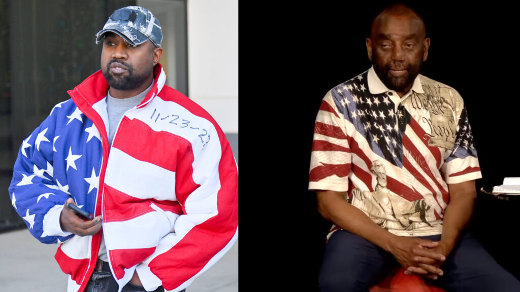 Kanye West wearing a jacket with an American flag design and a denim cap.