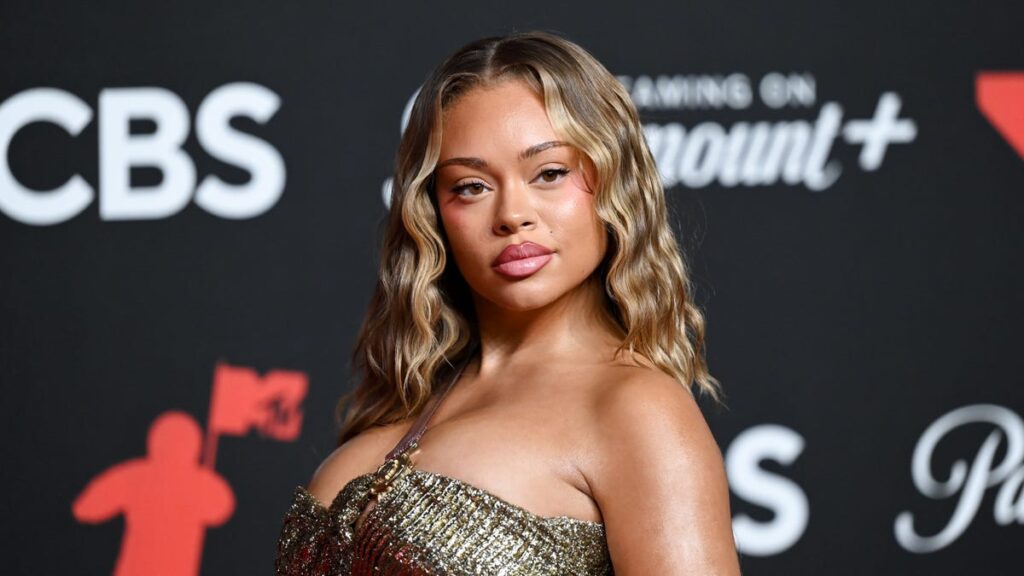 Latto Celebrates 27th Birthday With Cheeky Christmas-Themed Photos